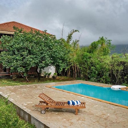 Saffronstays Boulevard Loghouse - A Wooden Chalet Amidst Nature Karli Bagian luar foto