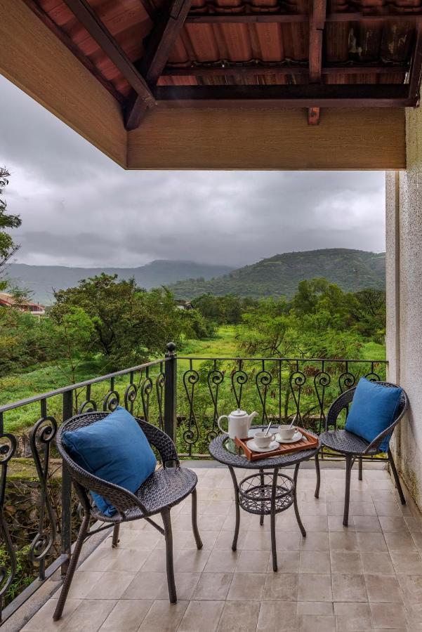 Saffronstays Boulevard Loghouse - A Wooden Chalet Amidst Nature Karli Bagian luar foto